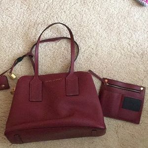 Marc Jacob’s purse. Burgundy in color.
